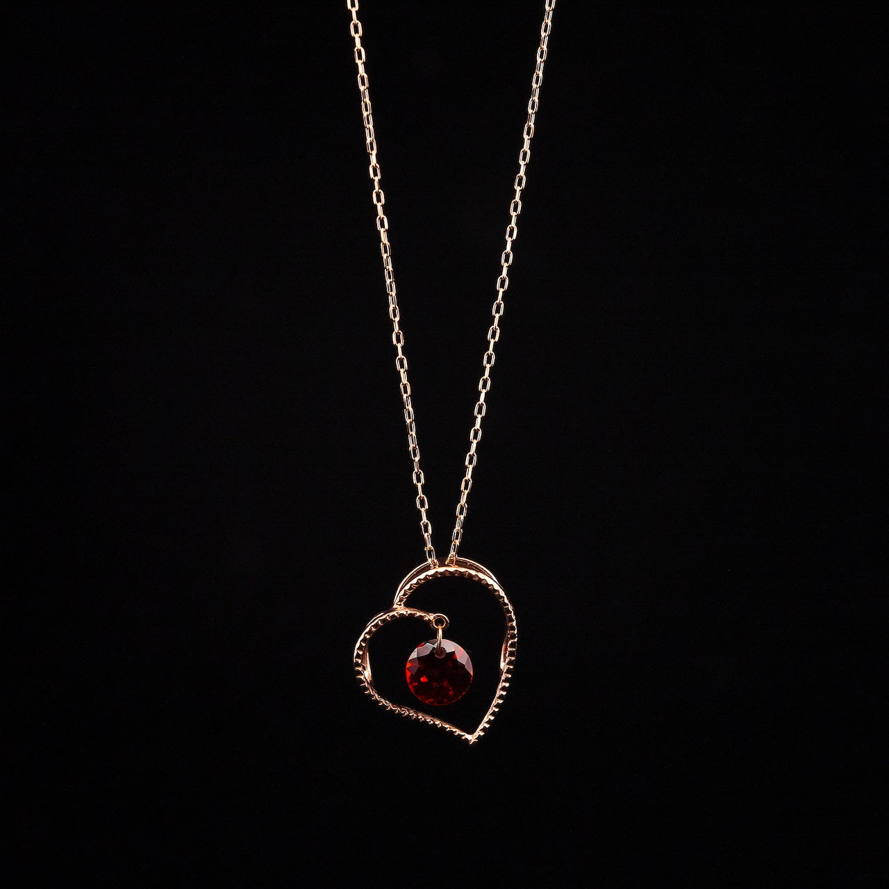 Gold Heart Circle Garnet