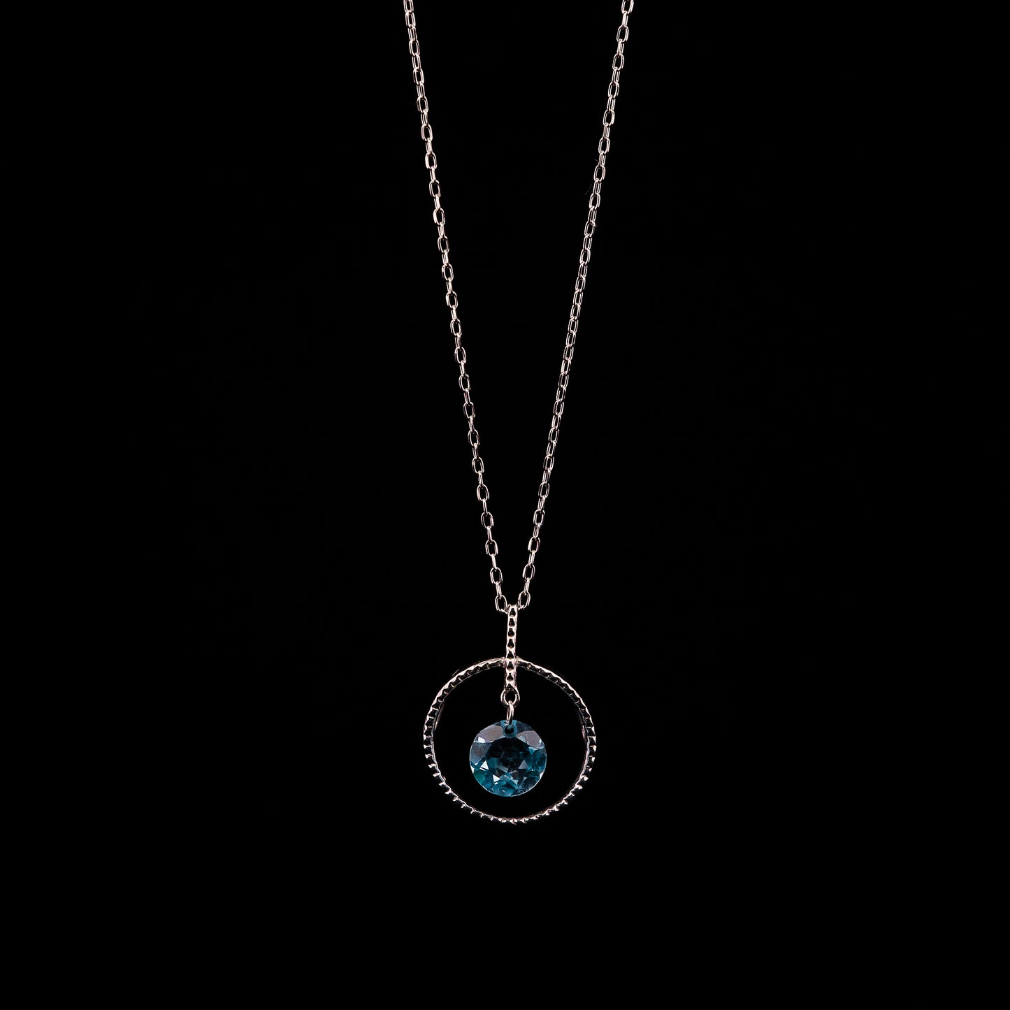 White Gold Circle Blue Topaz